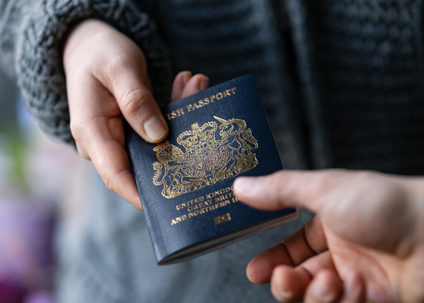 handing over a british passport