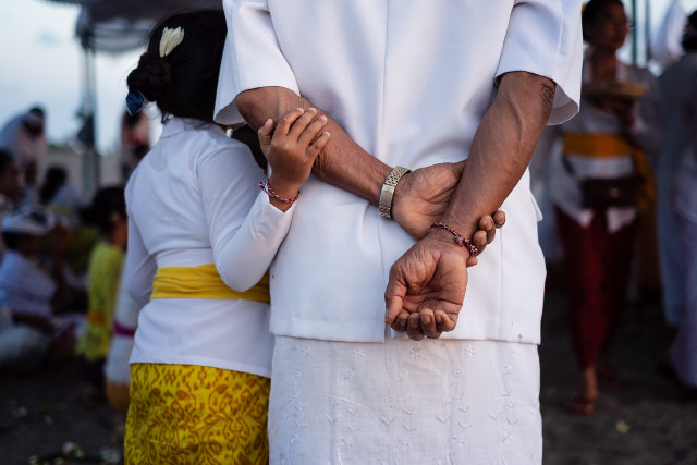 Child Holding Relatives Arm