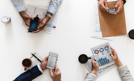 Four People Reviewing Data