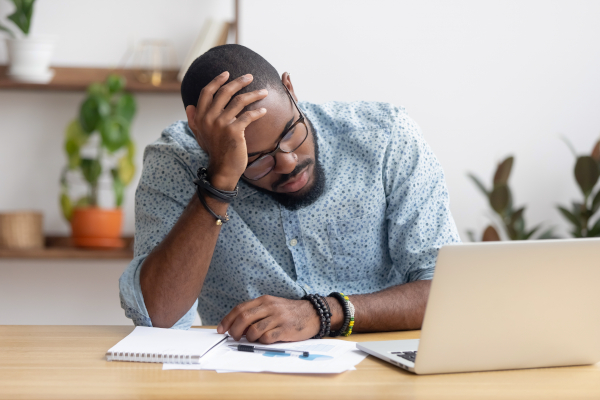 Distressed Man At Laptop