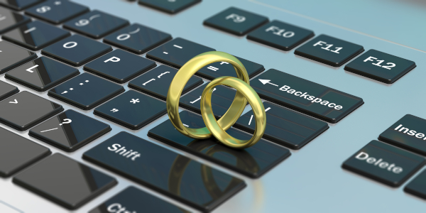 Wedding Rings On Laptop Keyboard