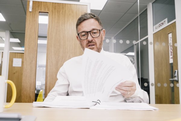 Marcus Reviewing Paperwork