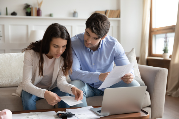 Couple working out How Much Is a UK Spouse Visa 2025