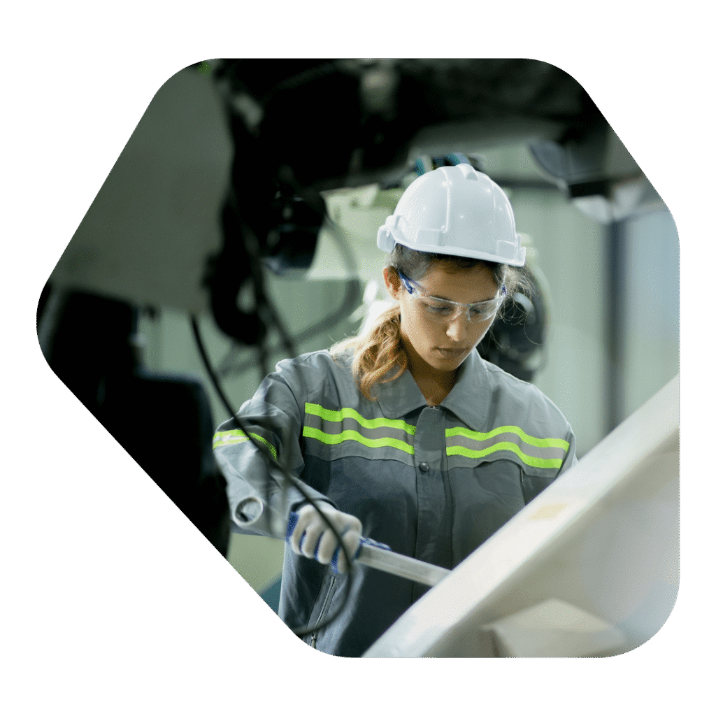 Female engineer working after business gets a sponsor licence