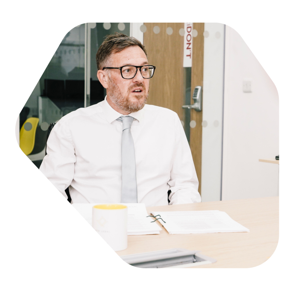 Civil Penalties for Illegal Working UK Man at desk