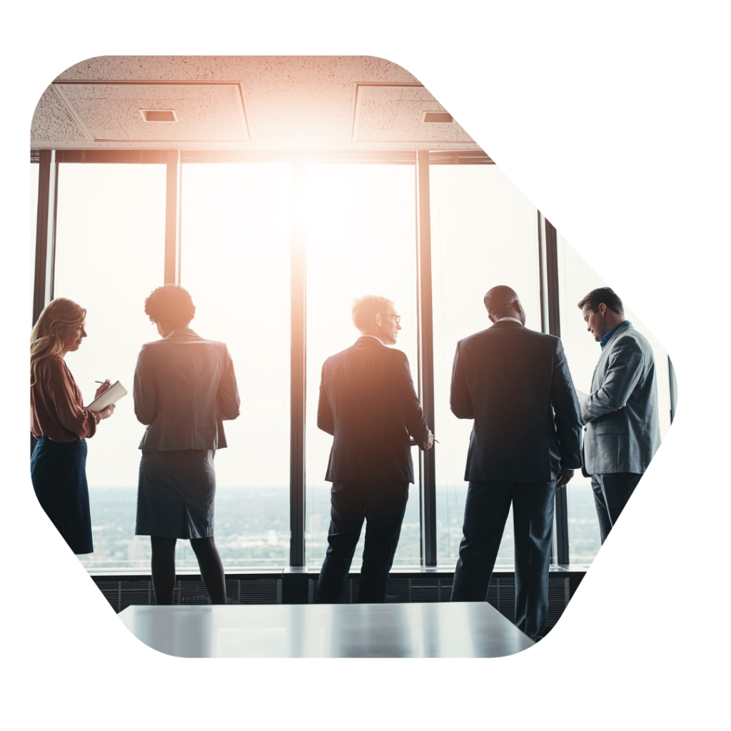 investor workers in office. Tier 1 Investor Visa Extension Solicitors
