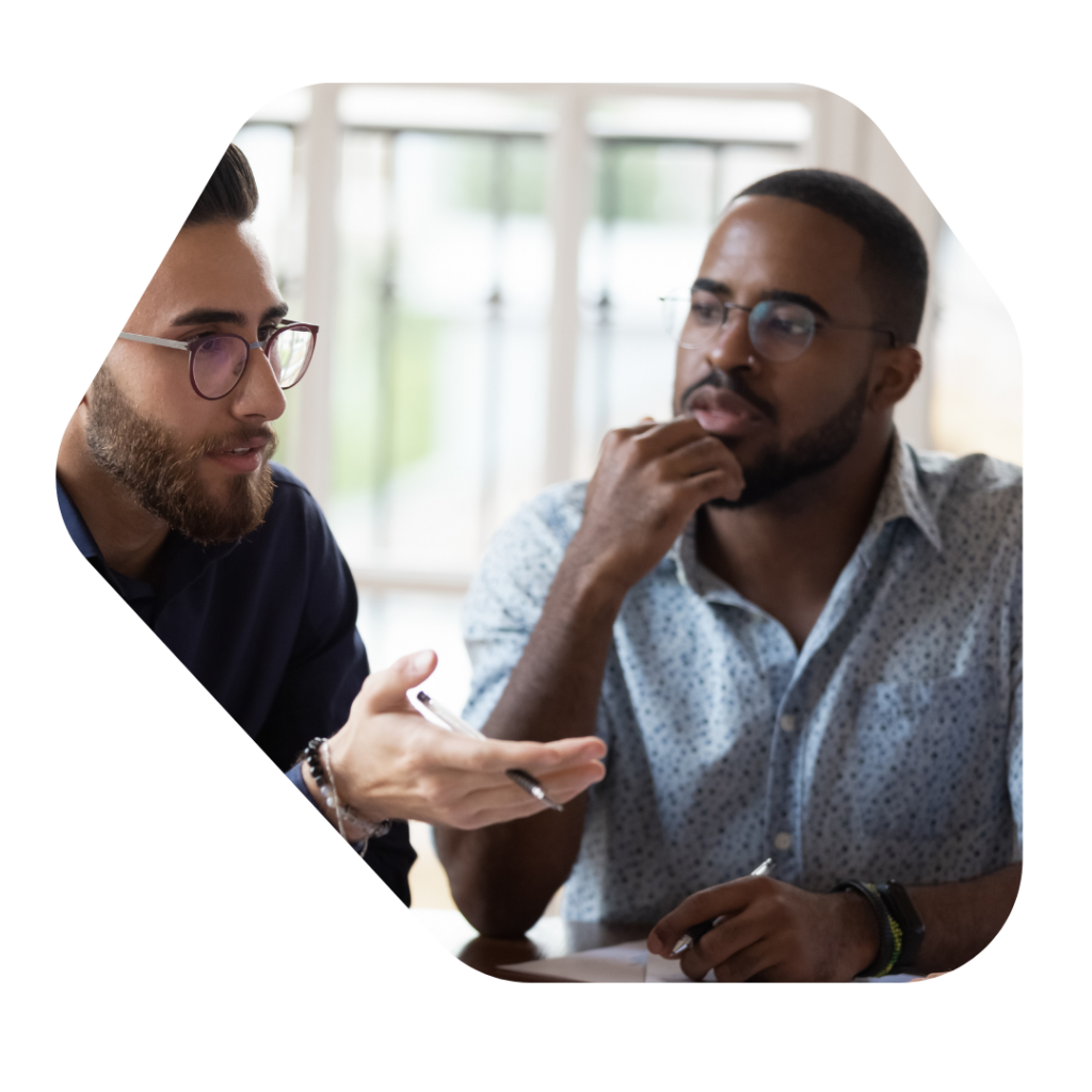 Men working in office. Tier 1 Investor Visa Extension Lawyers