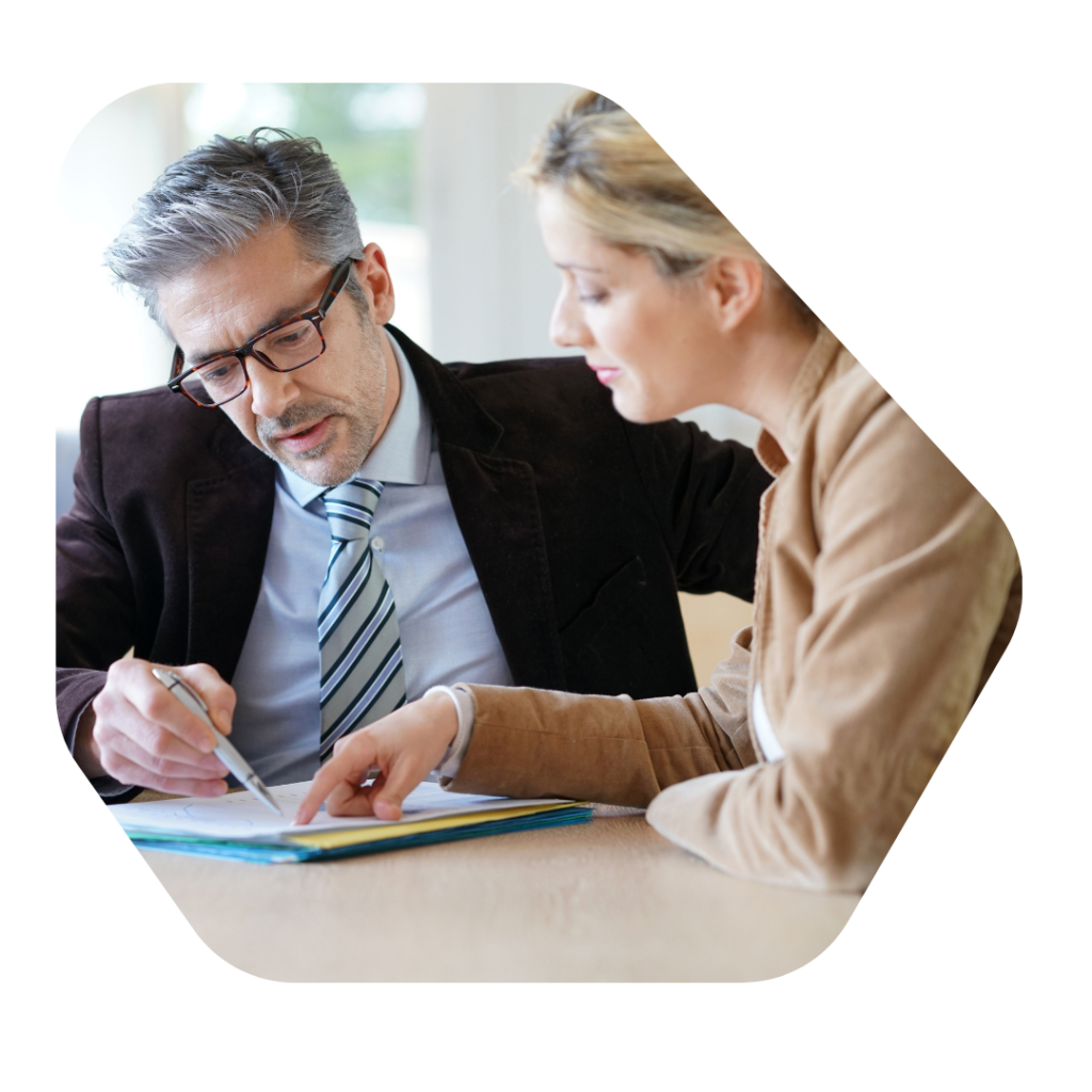 Man and woman discussing work. Tier 1 Investor Visa Extension UK