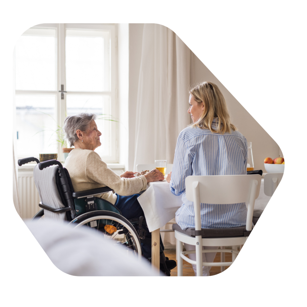 Lady in a wheelchair with her daughter. Adult Dependent Relatives Visa UK Application