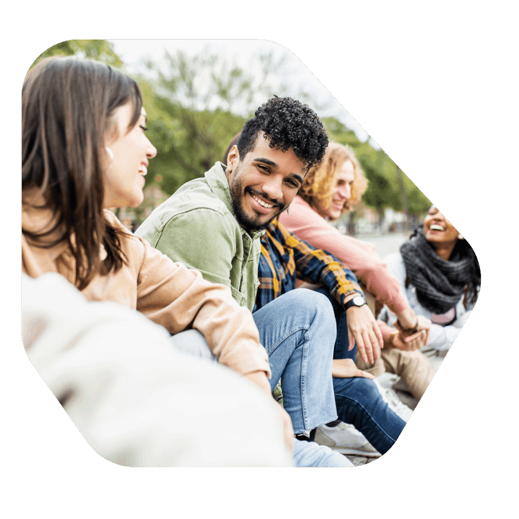 Male student with friends. Private Life Visa UK Solicitors