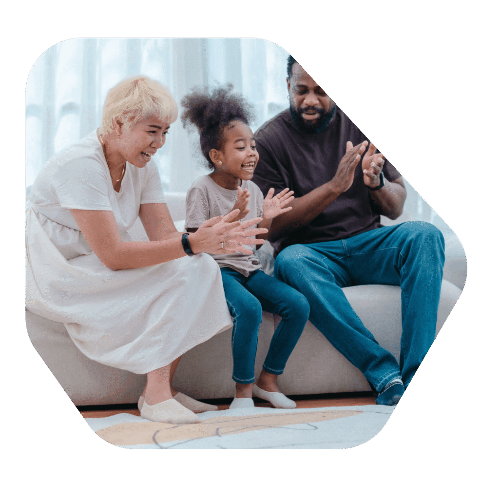 Grandmother with child and son on sofa. ILR 10 Year Long Residence Application