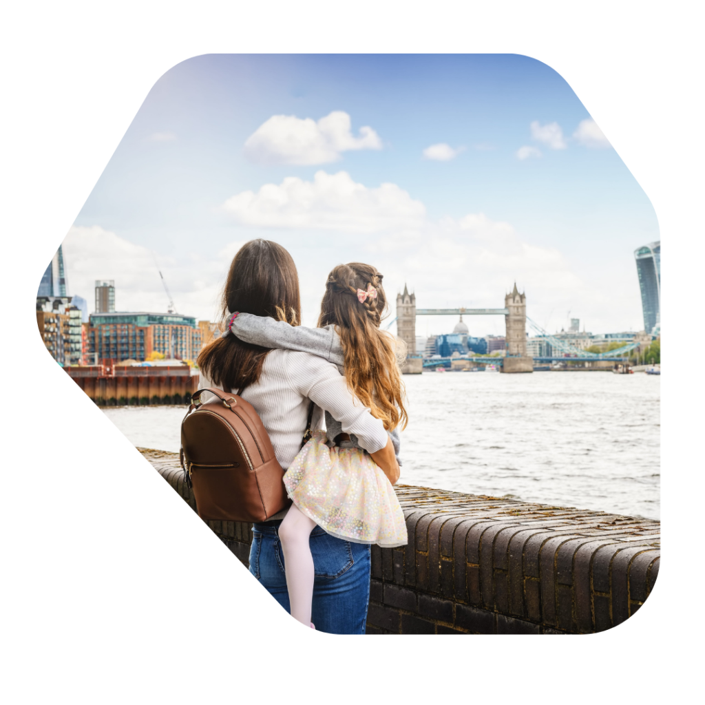 Mother and daughter looking at London bridge. British Citizenship for Child born in the UK application