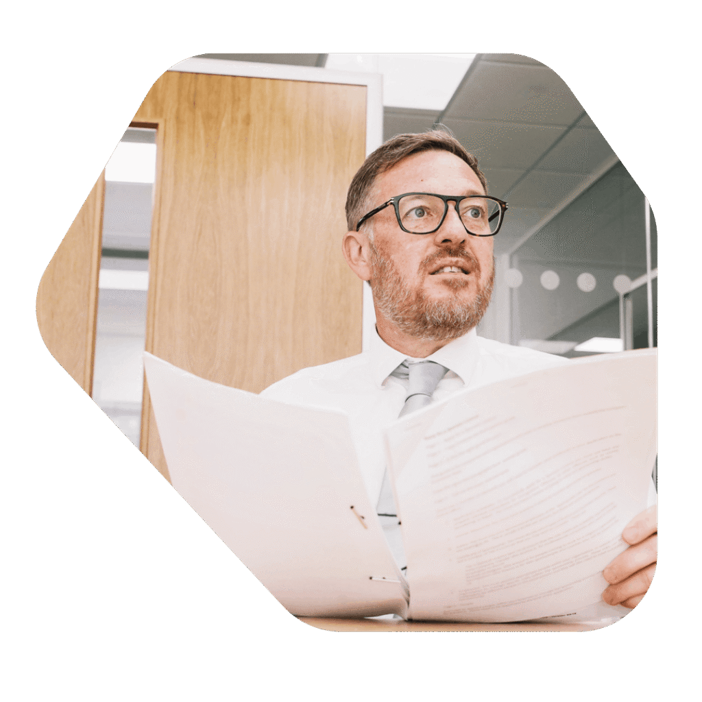 Male reading papers. Tier 1 Entrepreneur Visa UK Alternatives