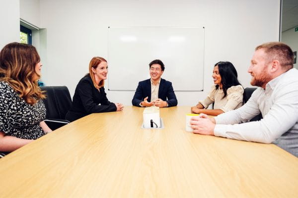 UK Immigration Lawyer discussing Crypto for UK Spouse Visa Financial Requirement at a round table