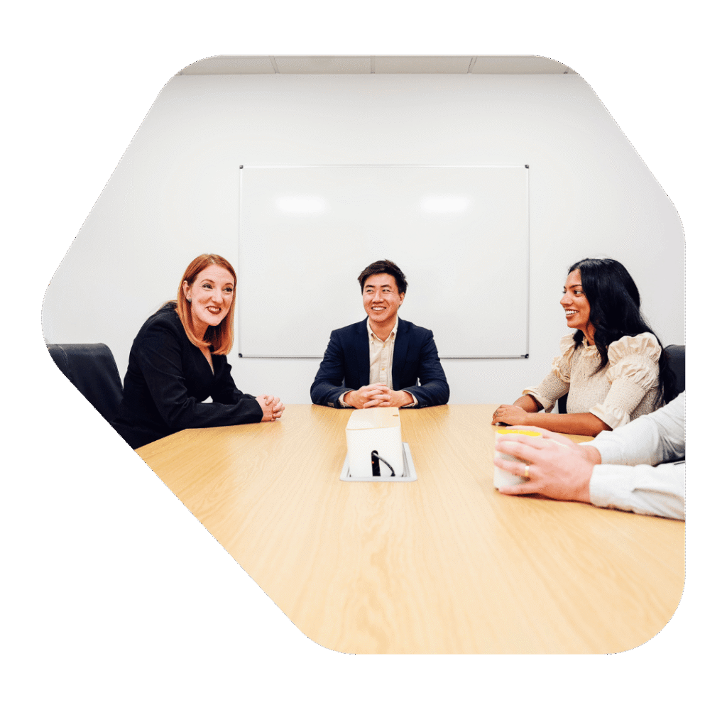 Immigration Lawyer Halifax meeting round a table